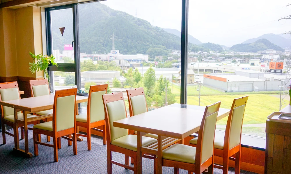 Inside the Sky Restaurant on the 7th floor, with mountain views from the windows